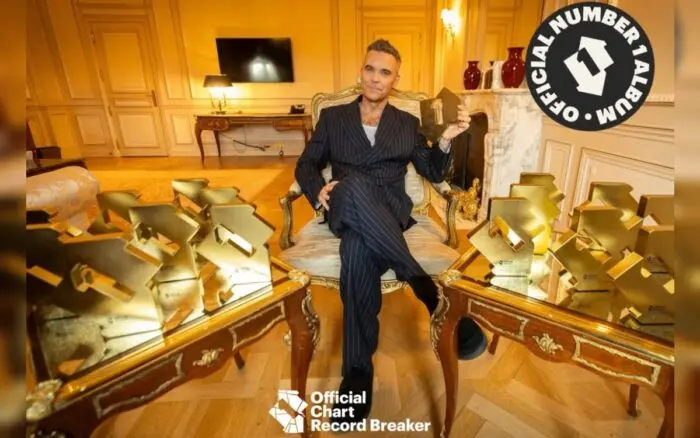 Robbie Williams supera el récord de The Beatles en llegar a la cima de las listas de éxitos en Reino Unido